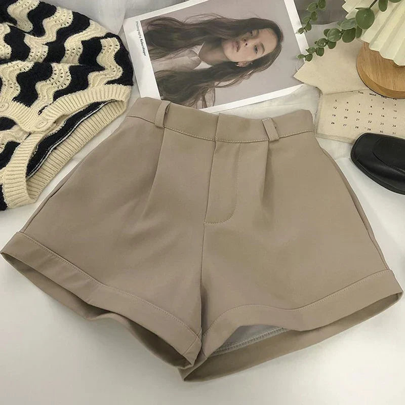 Versatile women's high waist shorts, ideal for elegant summer office wear or chic casual outfits.