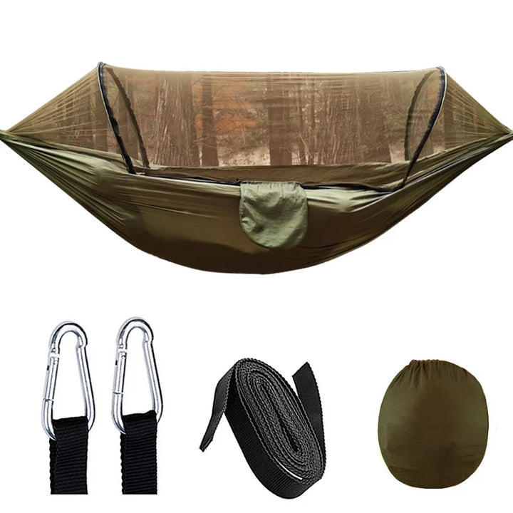 Durable parachute fabric camping hammock with bug net, ideal for hiking, travel, & outdoor adventure relaxation.