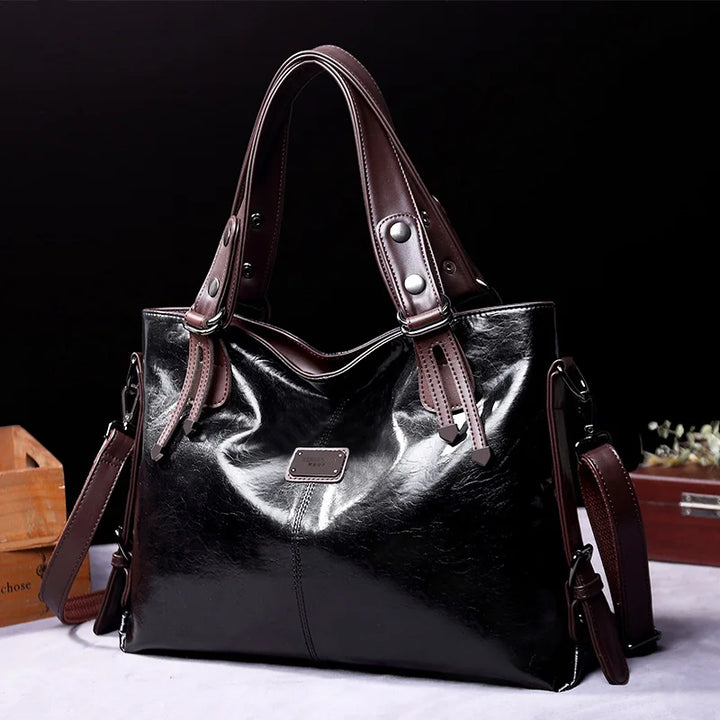 Luxury women's elegant leather handbag. Chic crossbody bag, durable fashion accessory for sophisticated style.