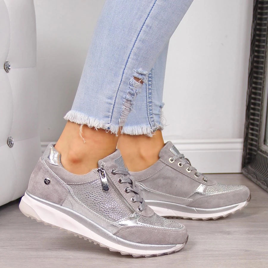 Stylish women's comfort sneakers with convenient zipper, perfect for daily wear & active lifestyles.