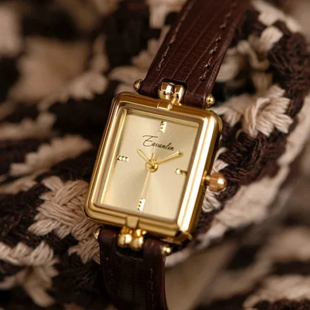 Sophisticated women's gold-tone quartz watch with a unique oval dial, perfect for daily wear.