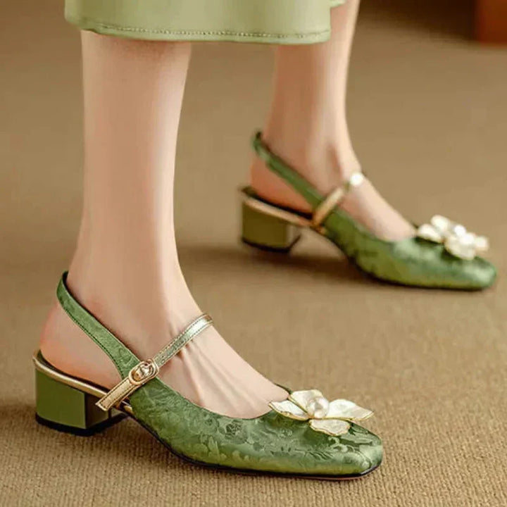 Luxurious floral jacquard block-heel pumps for women. Vintage-inspired elegant mid-heel design.