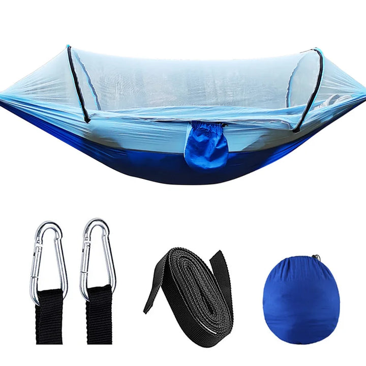 Compact travel hammock crafted from durable parachute fabric, featuring an essential built-in mosquito net.