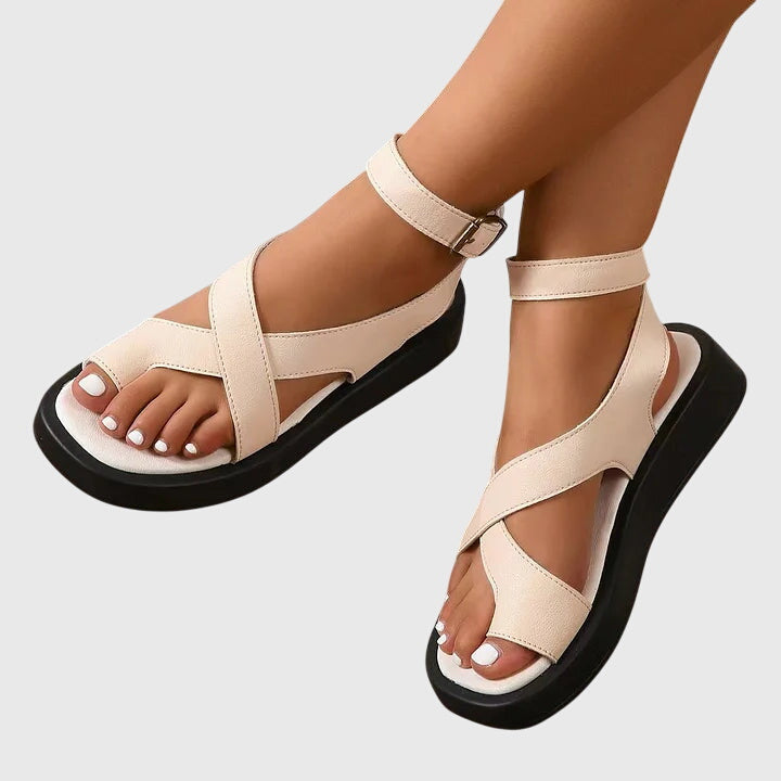 Elegant women's strappy sandals, gladiator style, featuring a comfortable platform heel.