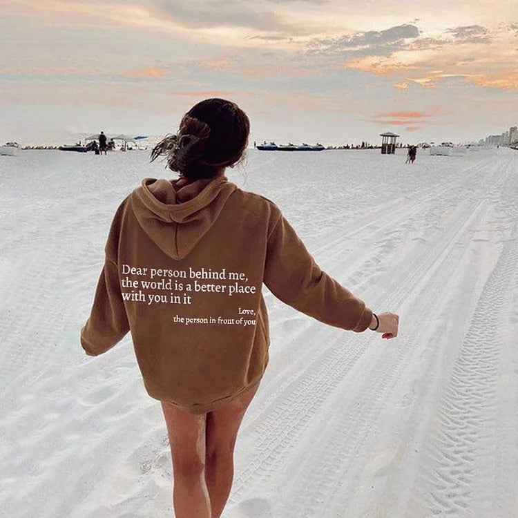Back view of women's 'Dear Person Behind Me' positive slogan hoodie. Inspiring graphic pullover for streetwear comfort.