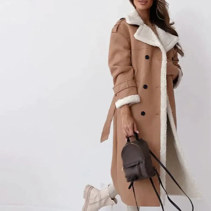 Classic women's long winter coat with plush teddy collar. Features a flattering silhouette & warm design for cold days.