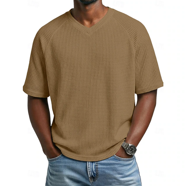 Men's textured V-neck short sleeve shirt. Soft, comfortable, and relaxed fit for versatile menswear.