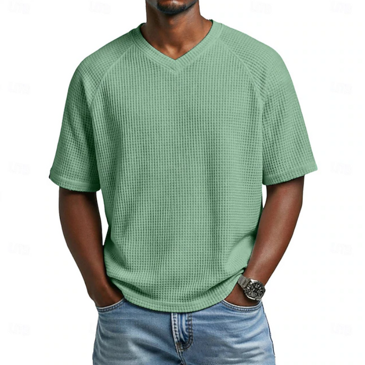 Versatile men's V-neck short sleeve textured top. Comfortable and relaxed fit for daily casual wear.
