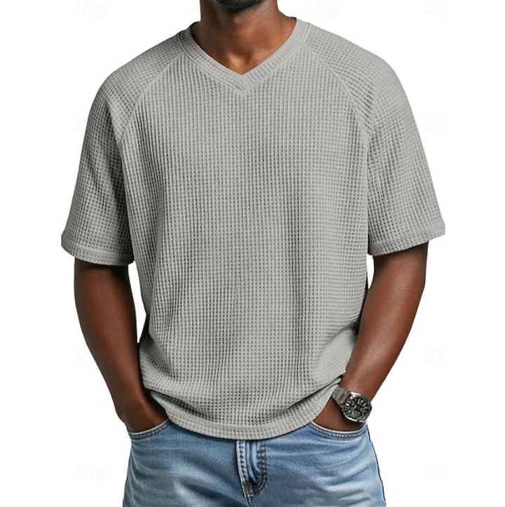 Stylish men's V-neck short sleeve textured shirt. Comfortable relaxed fit, perfect for casual summer wear.