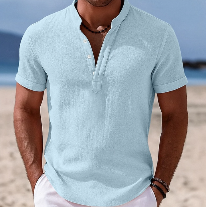 Lightweight men's summer shirt with short sleeves & button-up front. Perfect for a relaxed, breathable look.
