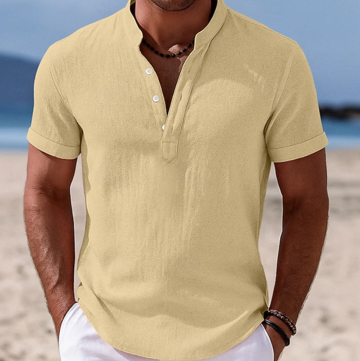 Relaxed fit men's summer button-up. Breathable short sleeve shirt, great for casual outings or holiday wear.