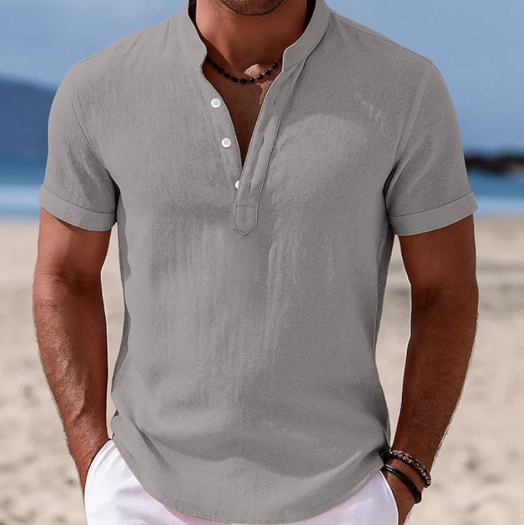 Stylish men's button-up short sleeve shirt. Perfect for summer casual wear, offering a relaxed fit & comfort.