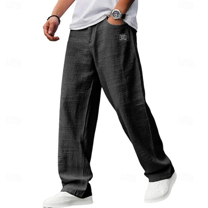 Adjustable waist men's casual pants, offering a comfortable loose fit for all-day wear.