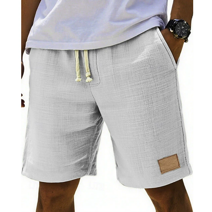 Men's relaxed fit summer shorts with lace drawstring for casual beachwear comfort.