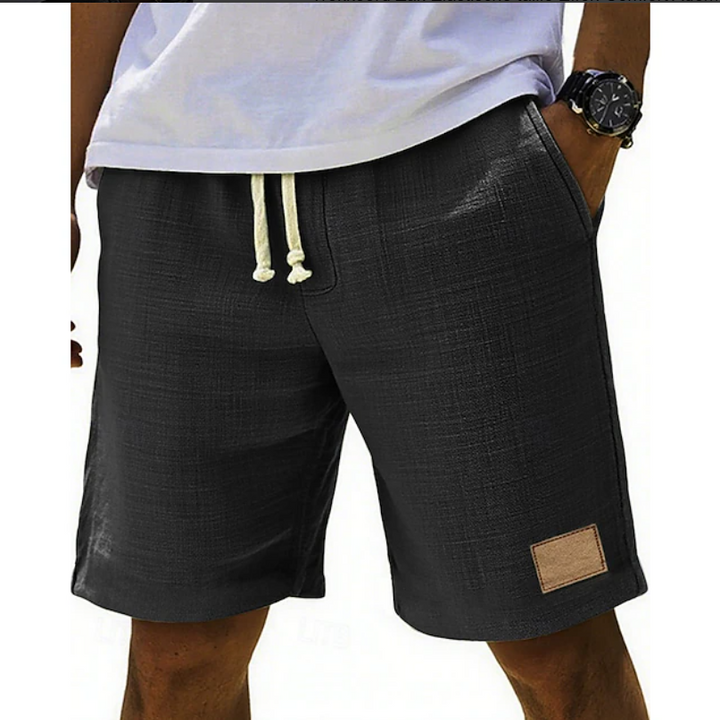 Men's casual relaxed fit shorts with adjustable lace waist, ideal for summer comfort.