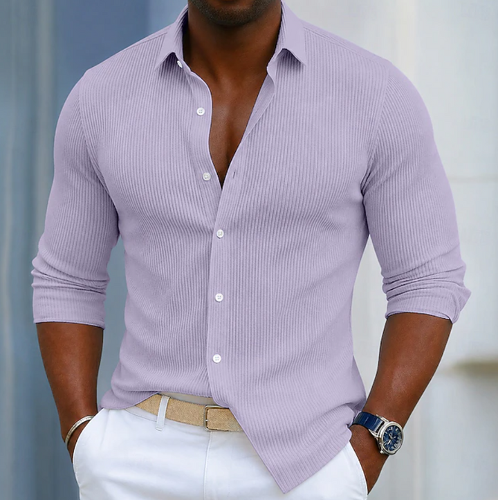 Modern men's slim fit Henley shirt with long sleeves, offering a sleek look for casual and smart casual occasions.