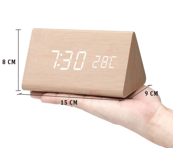 Contemporary LED digital clock, sound activated for convenient time check.