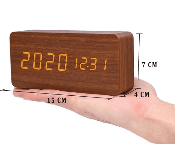 Contemporary LED alarm clock with sound activation, great for bedrooms.