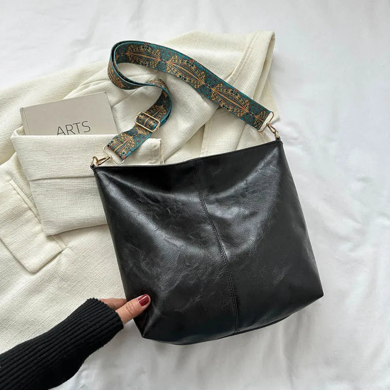 Elegant women's vintage leather cross body bag, handcrafted for lasting style & comfort.