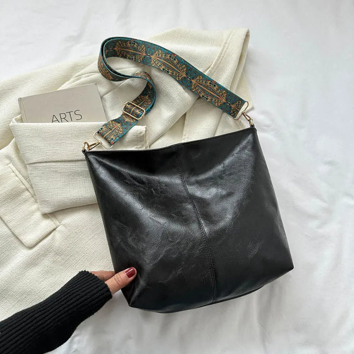 Elegant women's vintage leather cross body bag, handcrafted for lasting style & comfort.