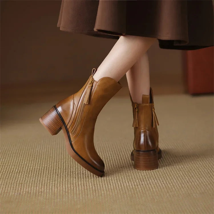 Women's Emery zip ankle boots featuring a sophisticated platform heel. Classic elegant style, comfortable & chic.