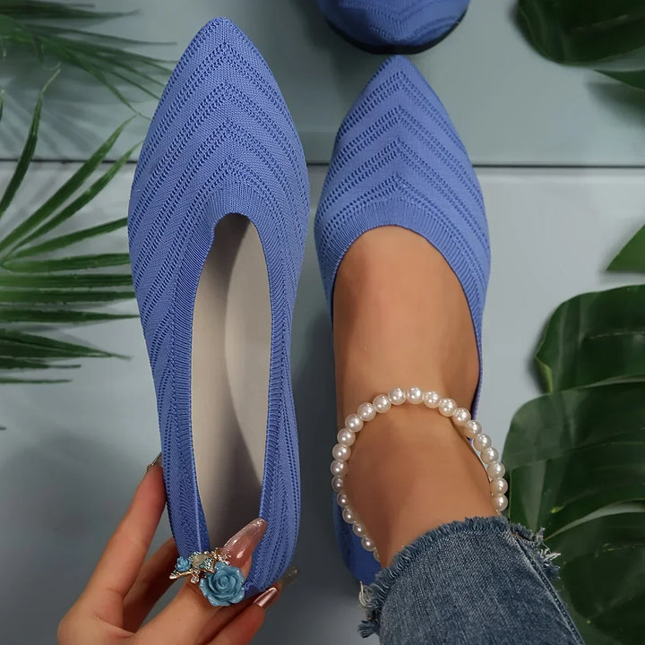 Stylish women's pointed-toe ballet flats, offering elegant comfort for any occasion.