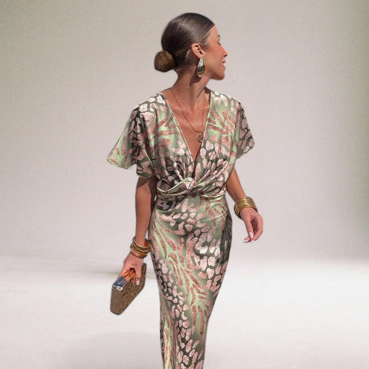 Stylish women's V-neck wrap maxi dress, suitable as an elegant wedding guest dress or formal occasion wear.
