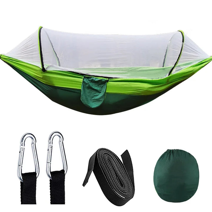 Lightweight portable hammock with a protective mosquito net, perfect for comfortable outdoor camping & relaxation.