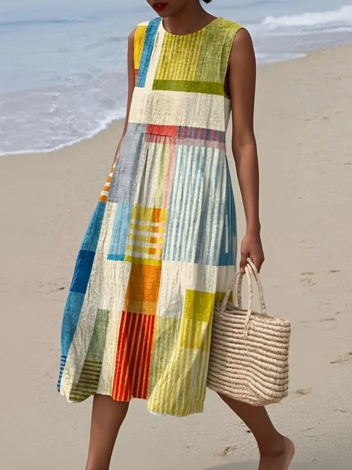 Women's elegant sleeveless art print midi dress. Flowy design, perfect for summer, office, or casual wear.