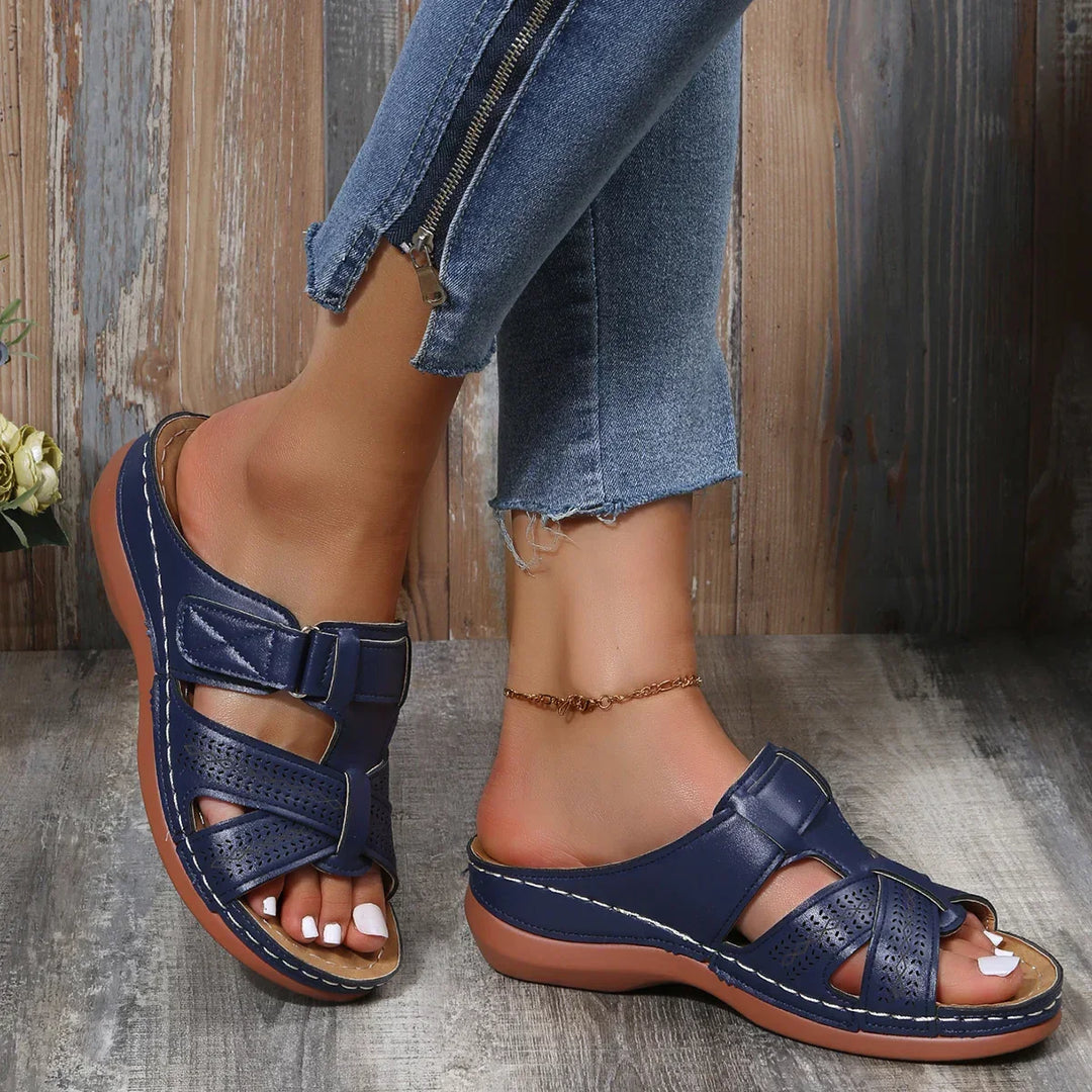 Comfortable women's walking sandals with orthopedic arch support and fashionable wedge heel.