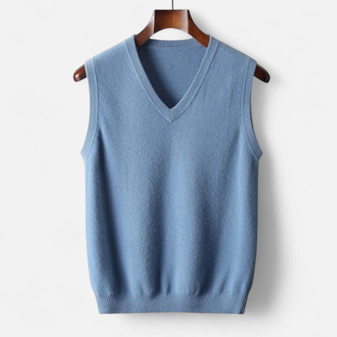 Stylish men's Merino wool V-neck knit vest. Soft, lightweight, and perfect for smart casual or formal outfits.