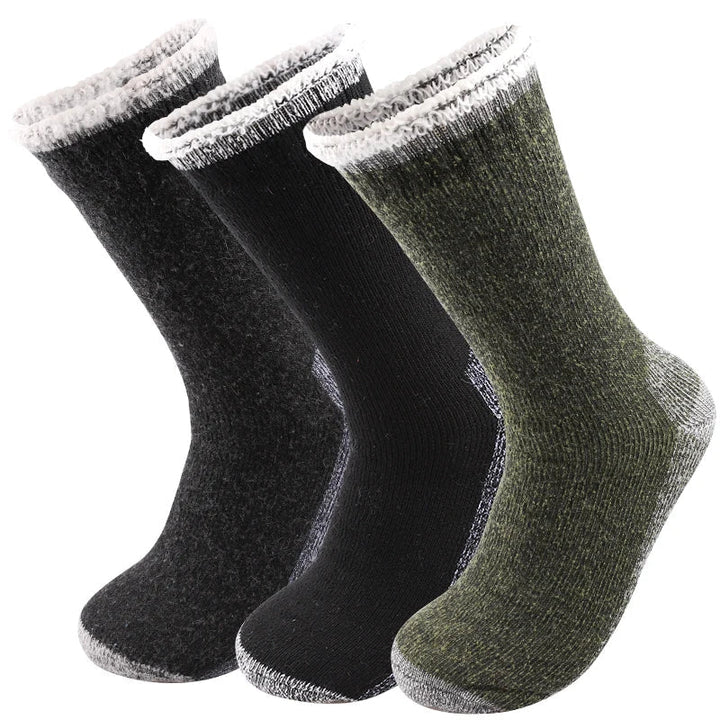 Mid-length men's thermal winter socks, 3-pack, designed for warmth & comfort in cold weather. Essential cozy footwear.