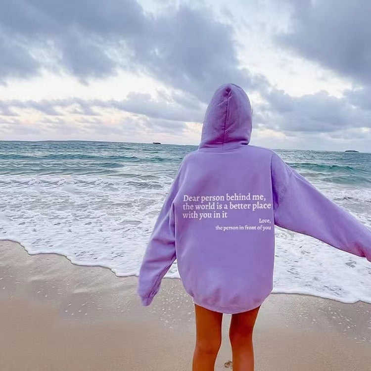 Women's pullover with 'Dear Person Behind Me' positive message. Comfortable graphic hoodie for inspiring casual wear.