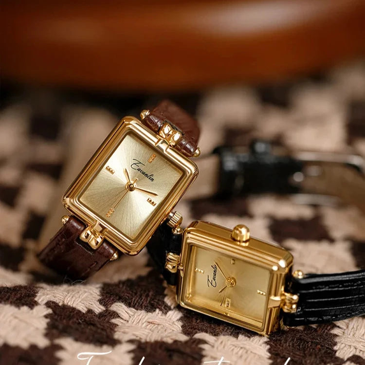 Detail of the shimmering gold-tone strap on an elegant women's quartz watch.