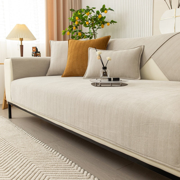 Pet-friendly, easy-clean sectional sofa cover in soft chenille; perfect furniture protection.