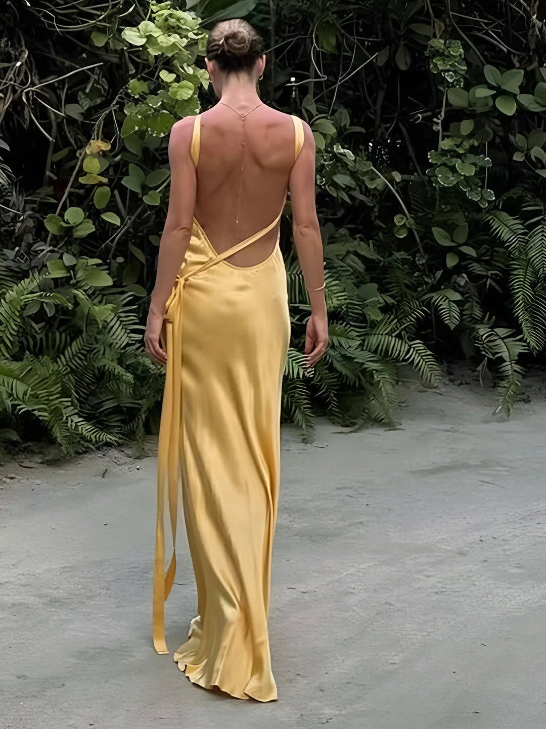 Elegant women's bright yellow maxi dress, perfect for weddings, special occasions, and formal events.