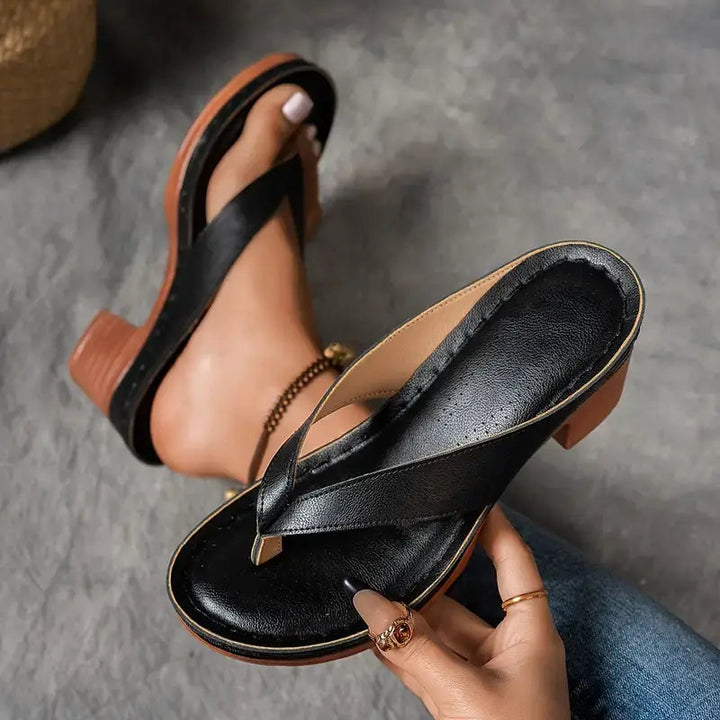 Stylish women's comfort mule slippers with ergonomic heel & arch support for cozy wear.