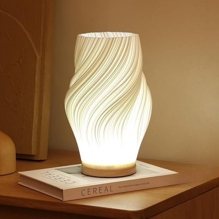 Sculpted Wavecrest Table Lamp by Nvroome, modern dimmable LED light for desk or bedside.