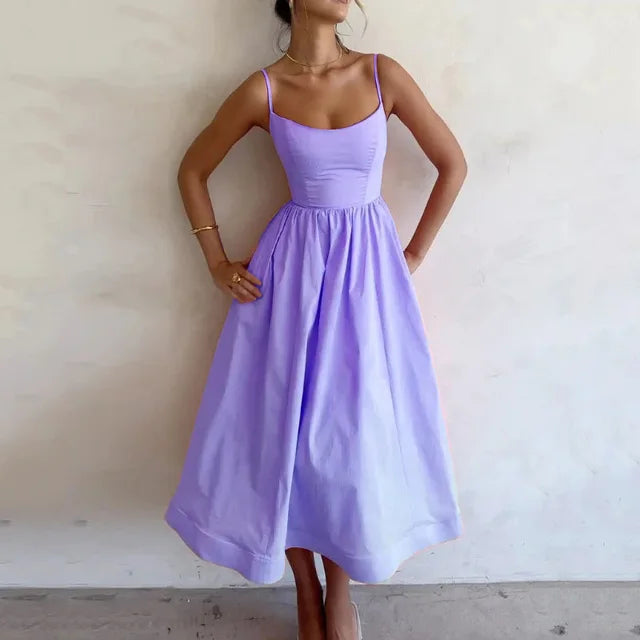 Sleek A-line women's maxi strap dress with a scoop neck, offering an elegant silhouette for evening and party wear.