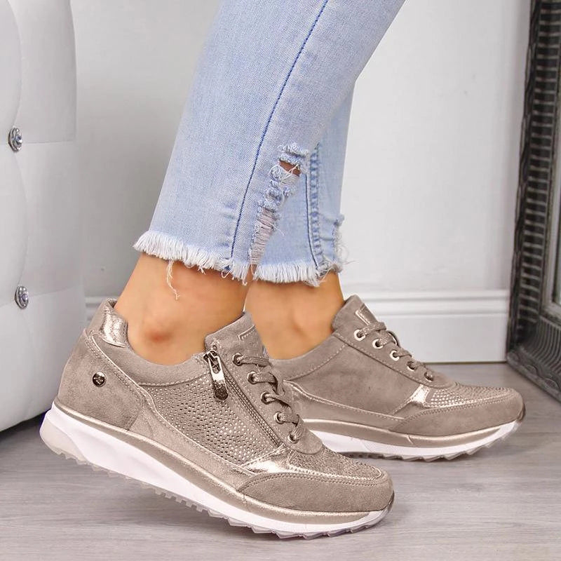 Fashionable women's active sneakers with zipper closure, ensuring comfort and stability for walking.