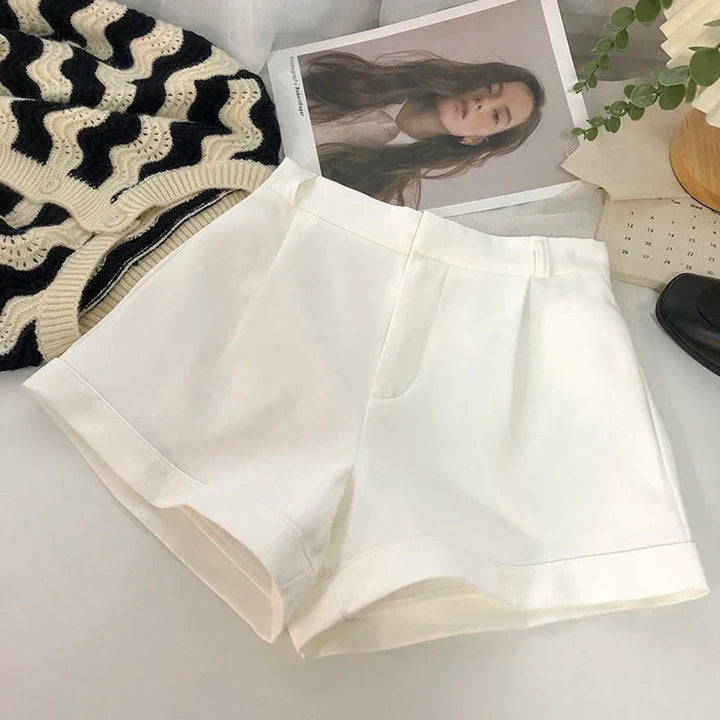 Stylish women's high waist wide leg shorts in a chic design, perfect for elegant summer fashion.