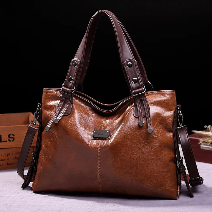 Versatile women's leather shoulder bag. Elegant crossbody handbag, durable and stylish for everyday fashion.