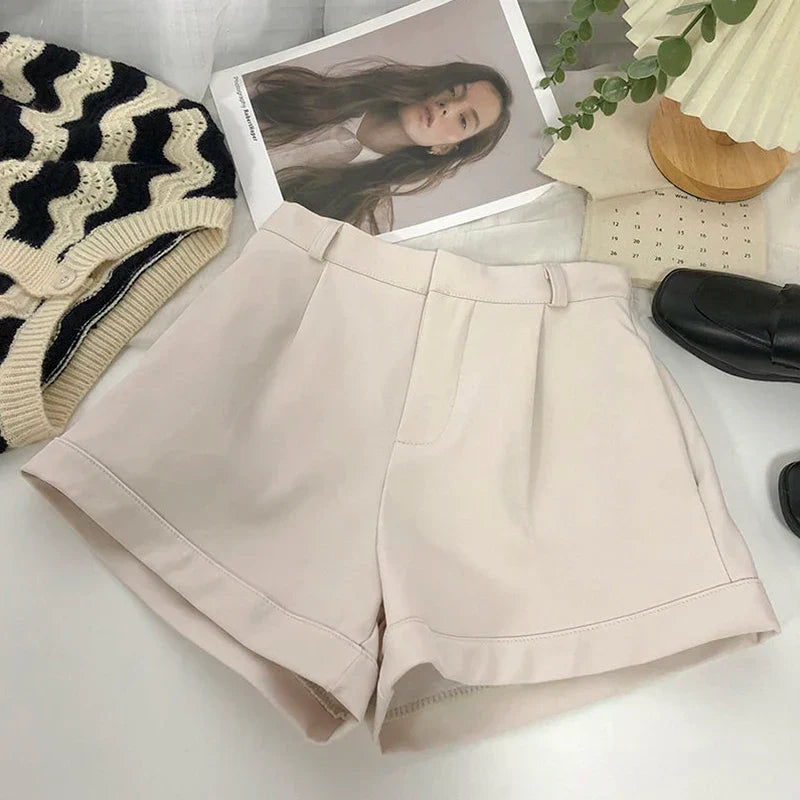 Fashionable women's high waist wide leg shorts, offering comfort & a stylish, elegant summer look.