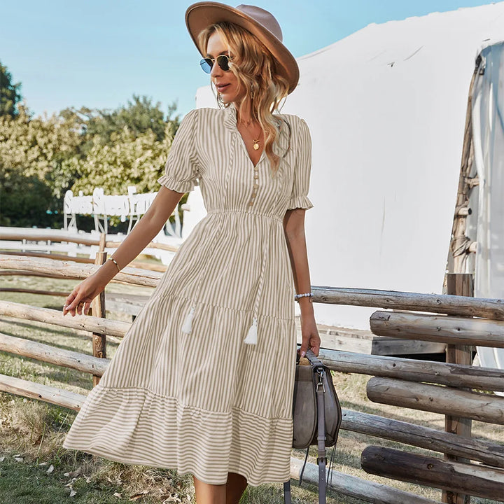 Chic women's summer V-neck dress with trendy ruffles, an easy-to-wear elegant option for warm weather.