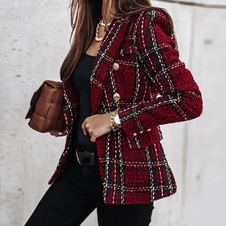 Stylish women's long sleeve checked blazer featuring a classic double-breasted cut, great for spring outfits.