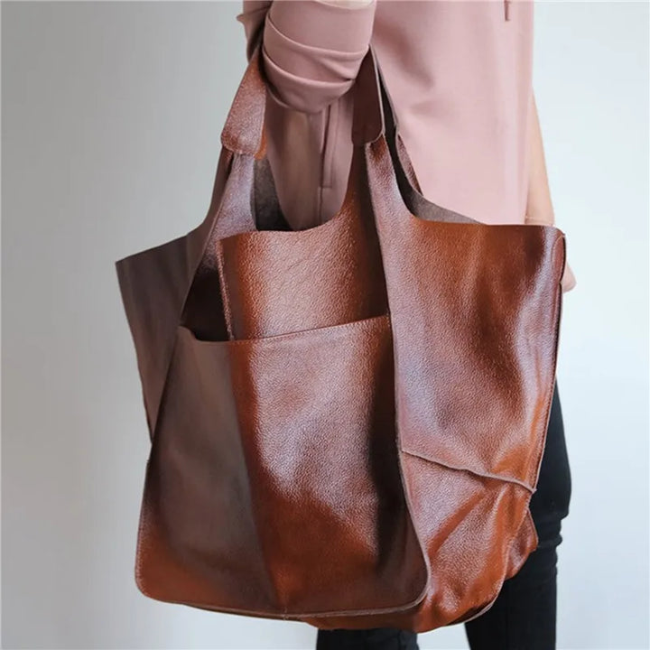 Vintage genuine leather crossbody bag for women, classic style & durable everyday fashion accessory.