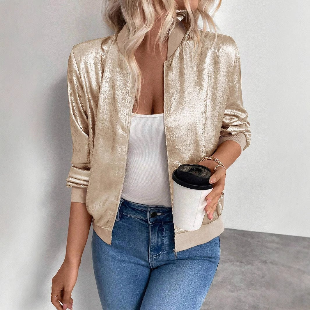 Fashionable women's shiny amber bomber jacket, perfect for spring and fall. Versatile casual outerwear.