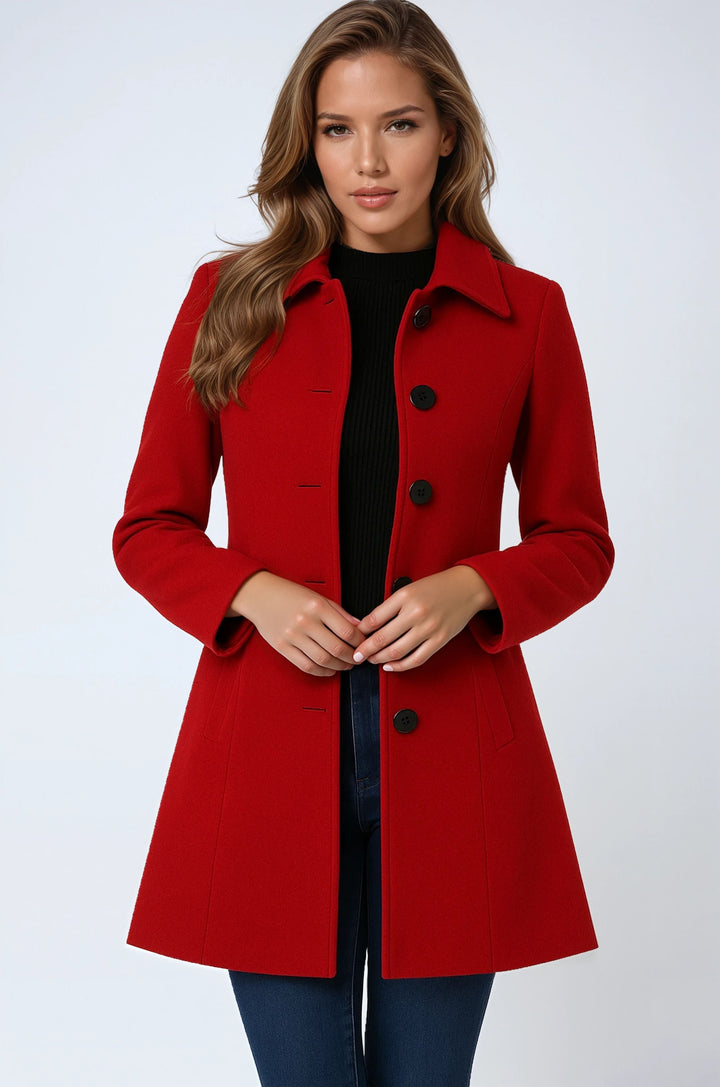 Stylish single-breasted trench coat for women. Long, elegant outerwear in a classic tailored fit for cold weather.