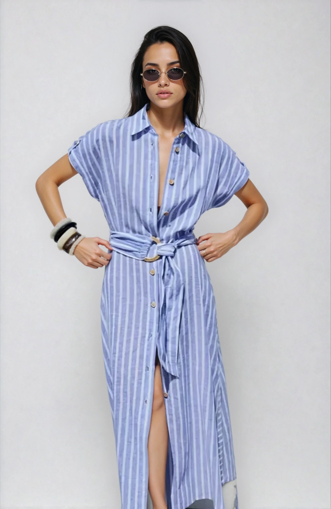Women's light blue striped button-down maxi dress with a matching belt, perfect for summer casual wear.