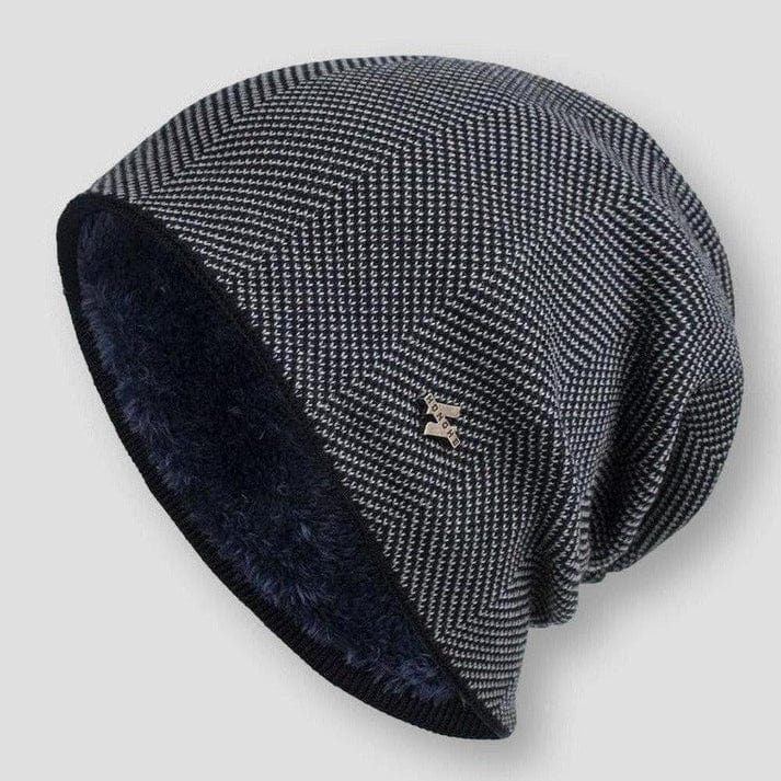 Close-up of women's chunky knitted wool beanie, showcasing soft texture. Ideal warm hat for winter fashion.